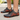 Cascade barefoot water shoe in orange, lifestyle view