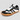 Heron barefoot shoe in white + black, studio