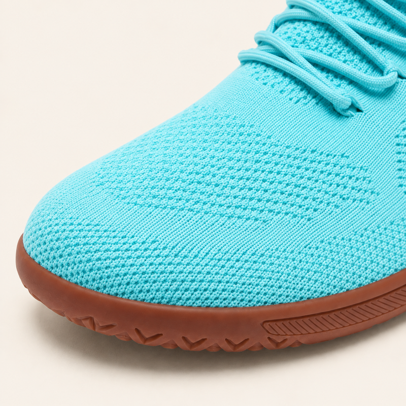 Close up of Stride knit upper showing one continuous surface with no seam